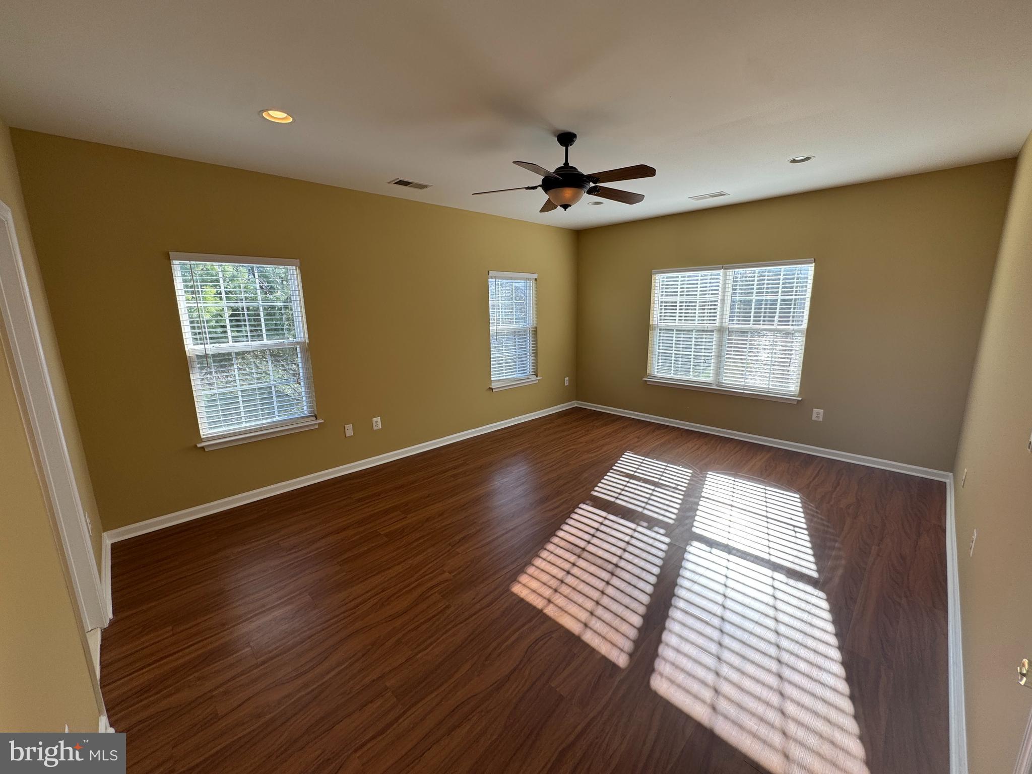 400 Kintyre Lane Stephens City, VA 22655 - Photo 19 of 33 a view of an empty room with a window and wooden floor