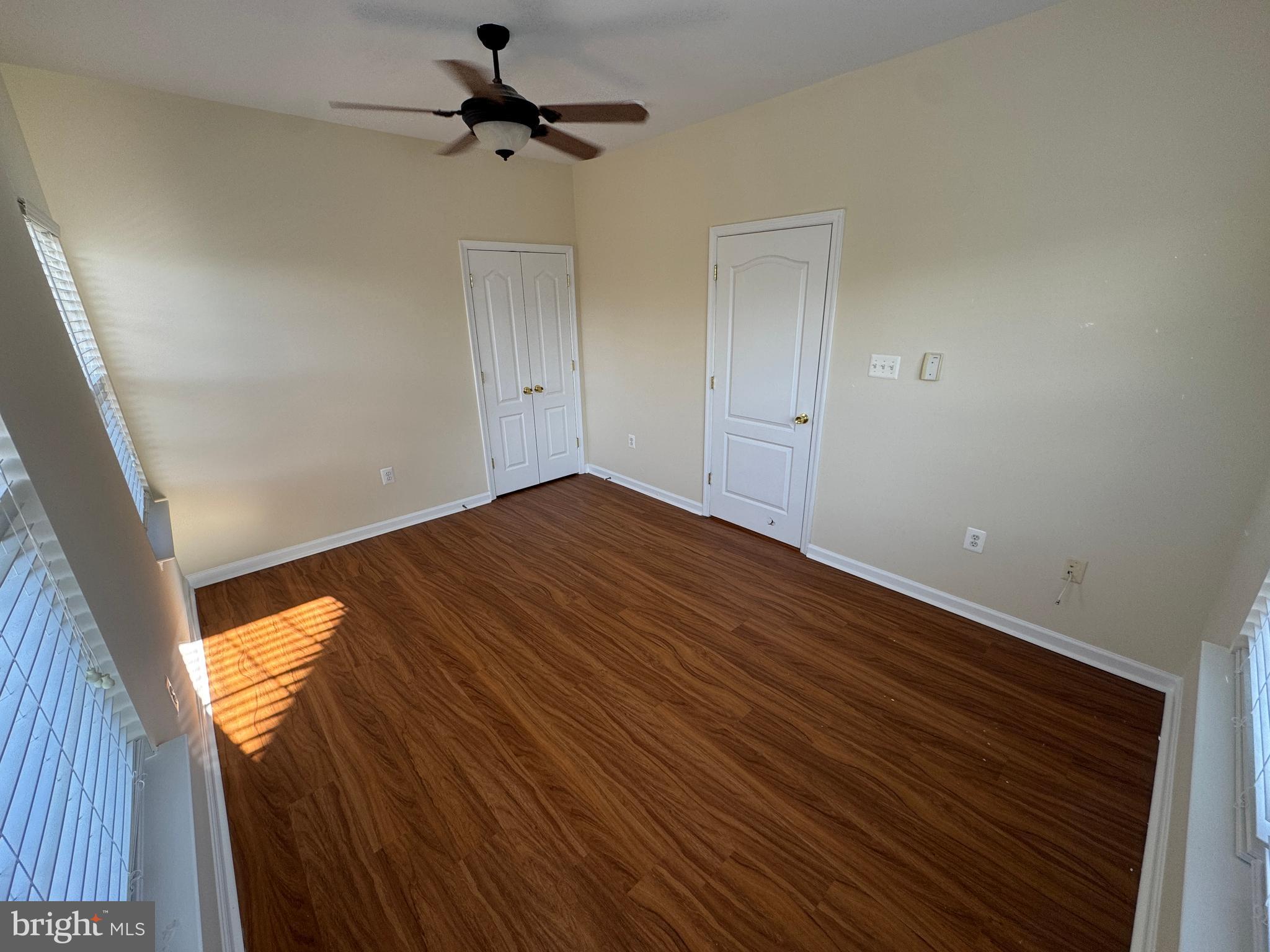 400 Kintyre Lane Stephens City, VA 22655 - Photo 26 of 33 a view of empty room with wooden floor and fan