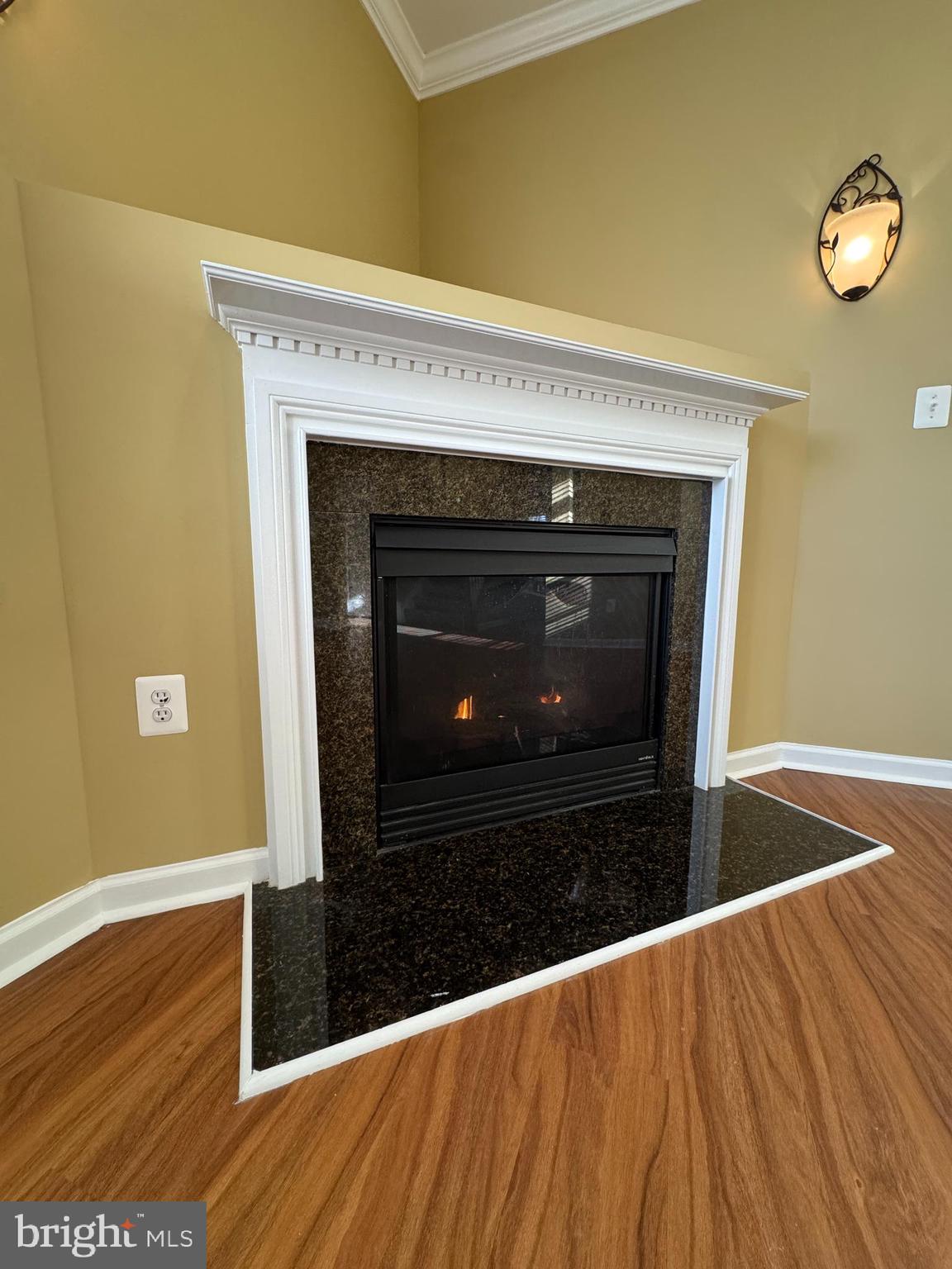 400 Kintyre Lane Stephens City, VA 22655 - Photo 7 of 33 a view of an empty room with wooden floor and a fireplace