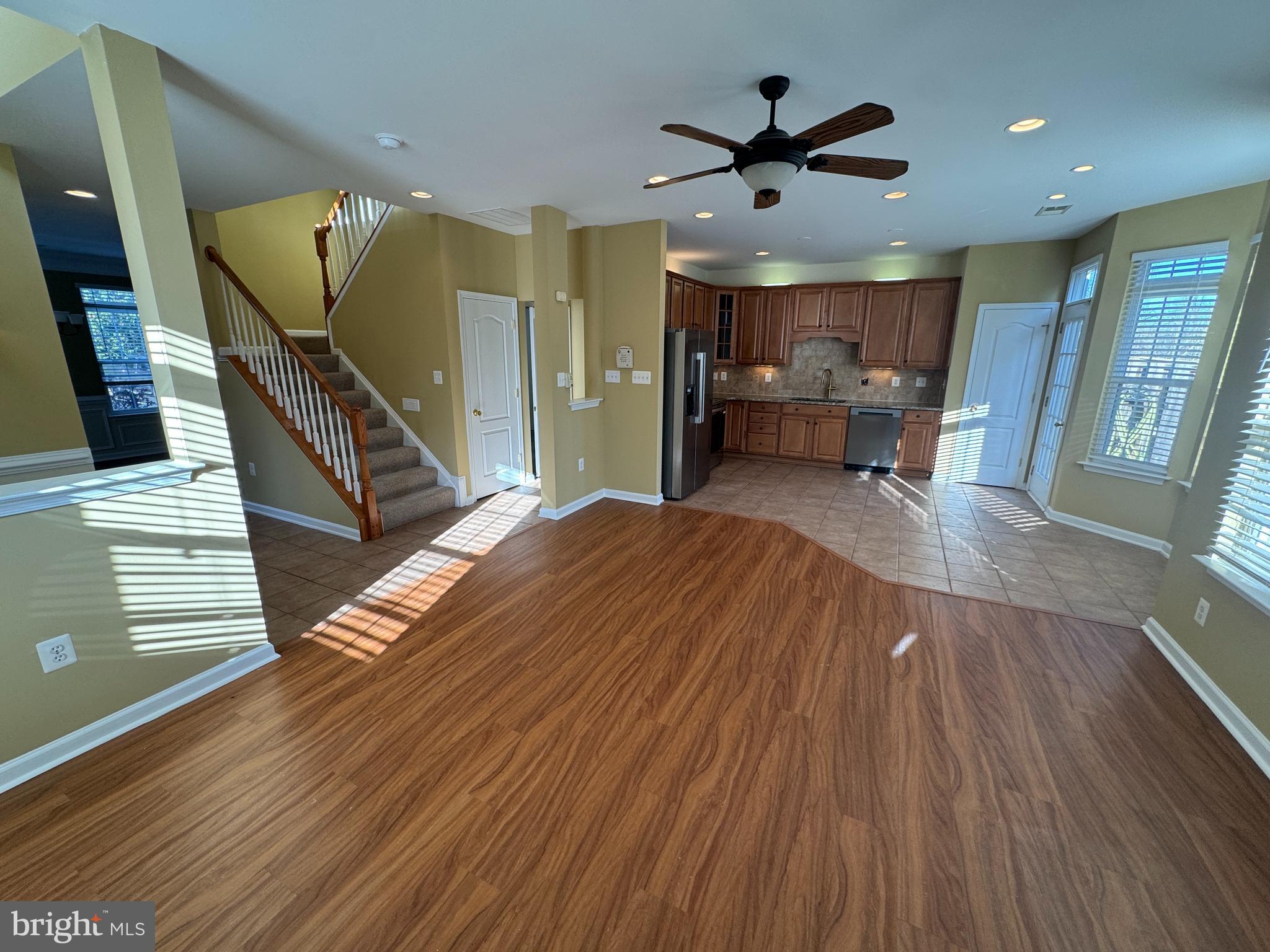 400 Kintyre Lane Stephens City, VA 22655 - Photo 8 of 33 a view of a livingroom with a ceiling fan and wooden floor