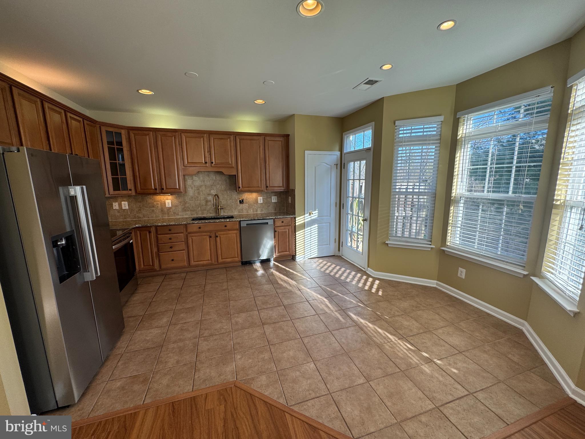 400 Kintyre Lane Stephens City, VA 22655 - Photo 9 of 33 a kitchen with stainless steel appliances granite countertop a refrigerator and a sink