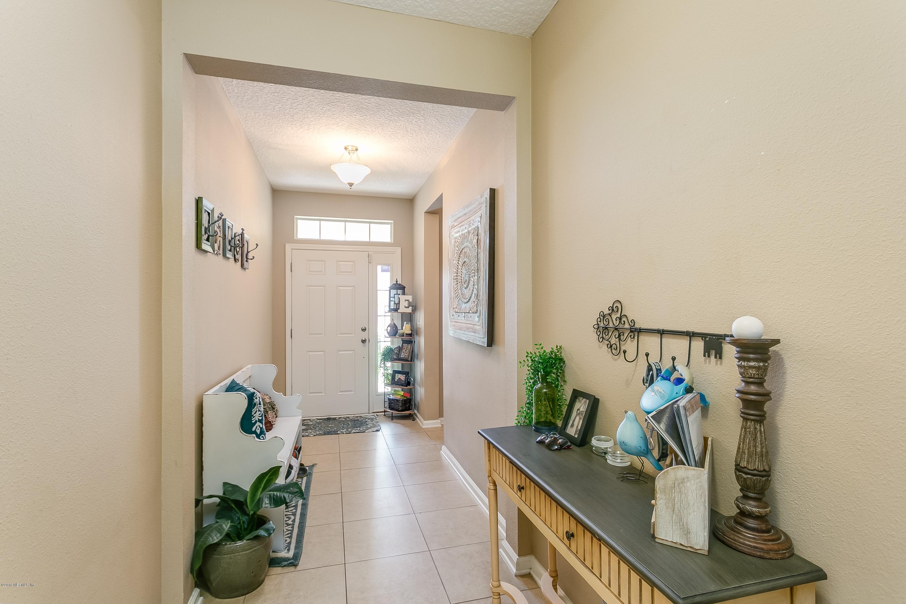 16378 Tisons Bluff Road Jacksonville, FL 32218 - Photo 2 of 24 a view of hall way with furniture