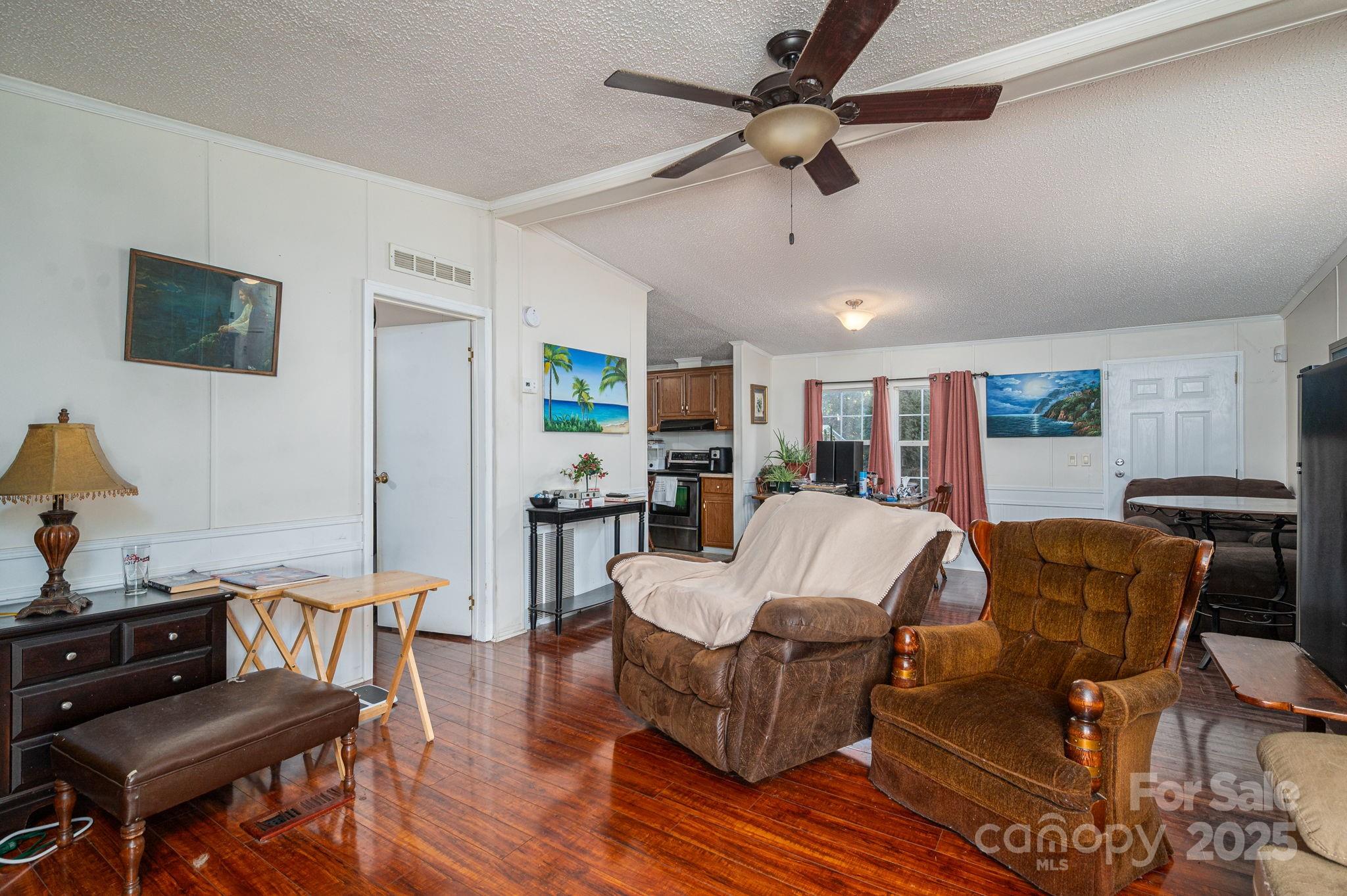 866 Marys Grove Road Cherryville, NC 28021 - Photo 16 of 24 a living room with furniture and a wooden floor
