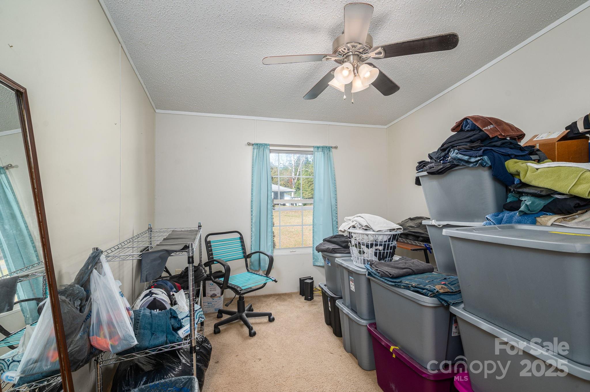 866 Marys Grove Road Cherryville, NC 28021 - Photo 21 of 24 a bedroom with a workspace