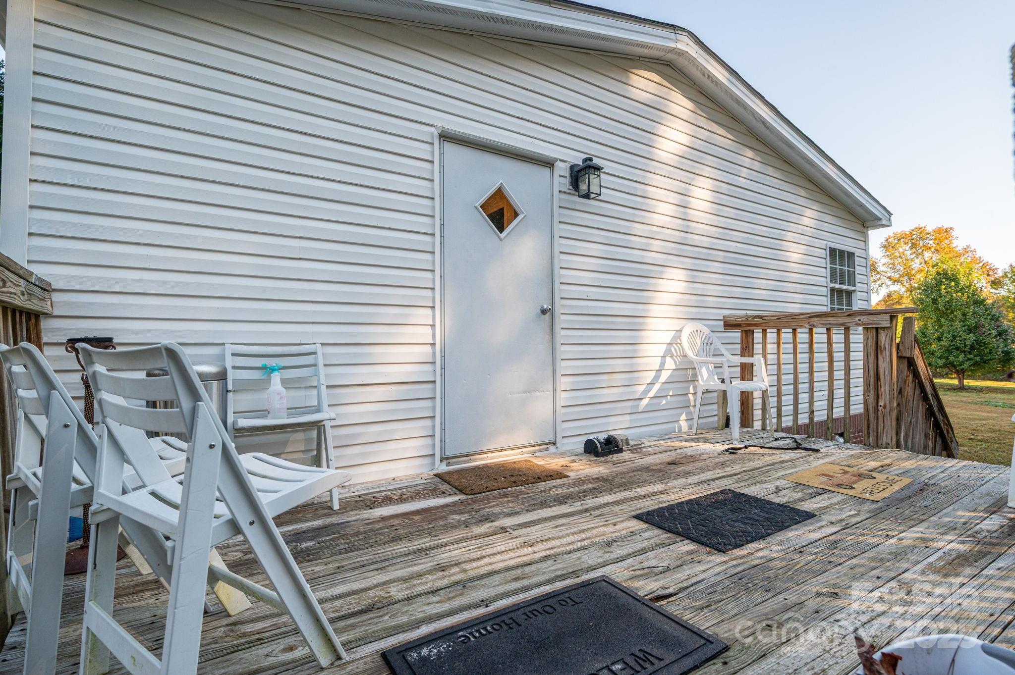 866 Marys Grove Road Cherryville, NC 28021 - Photo 4 of 24 a view of a patio with a table and chairs