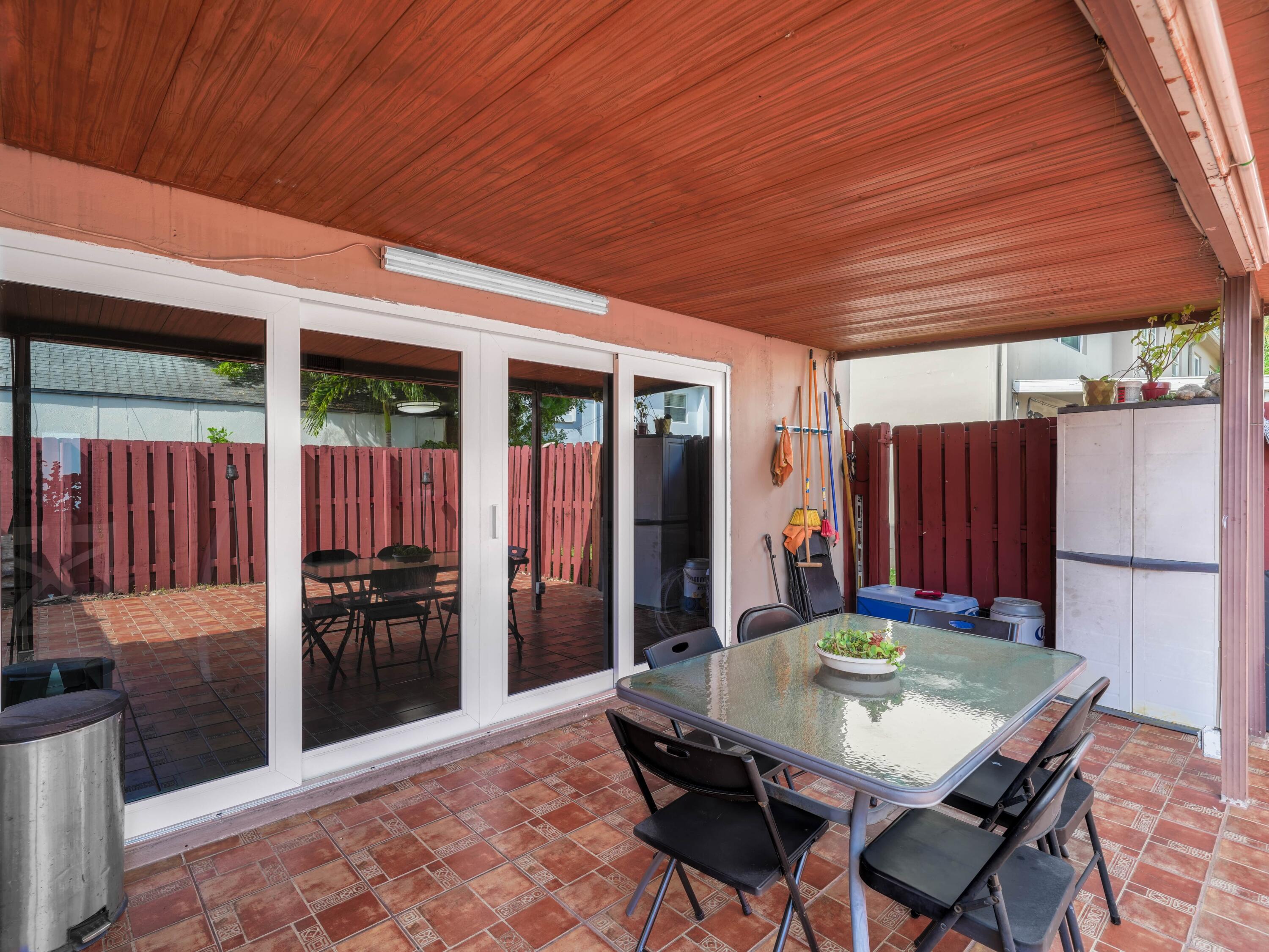 3672 Southwest 59th Terrace, Unit 73 Davie, FL 33314 - Photo 27 of 39 a view of a backyard with furniture and a backyard