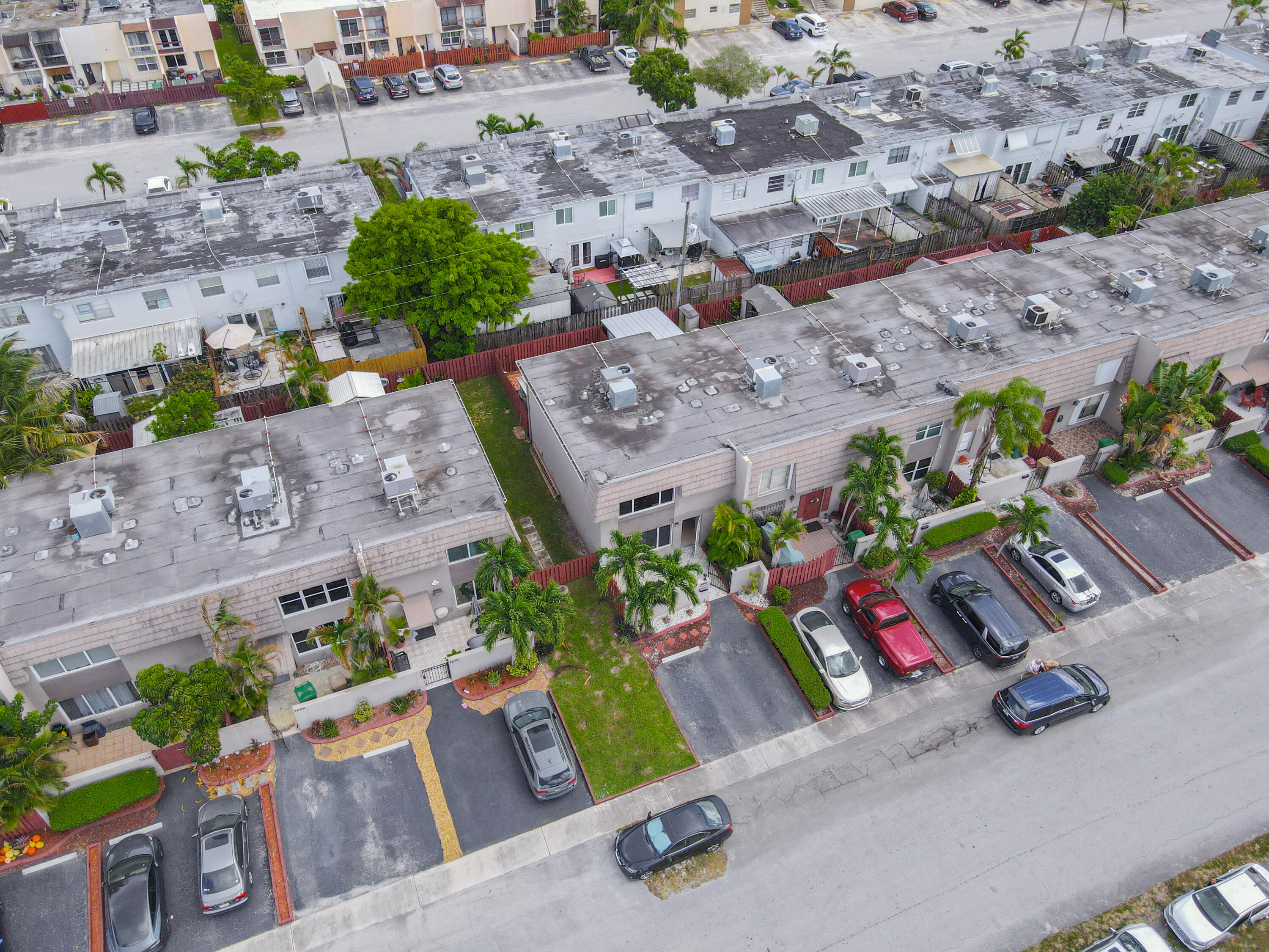 3672 Southwest 59th Terrace, Unit 73 Davie, FL 33314 - Photo 34 of 39 an aerial view of a house with a yard