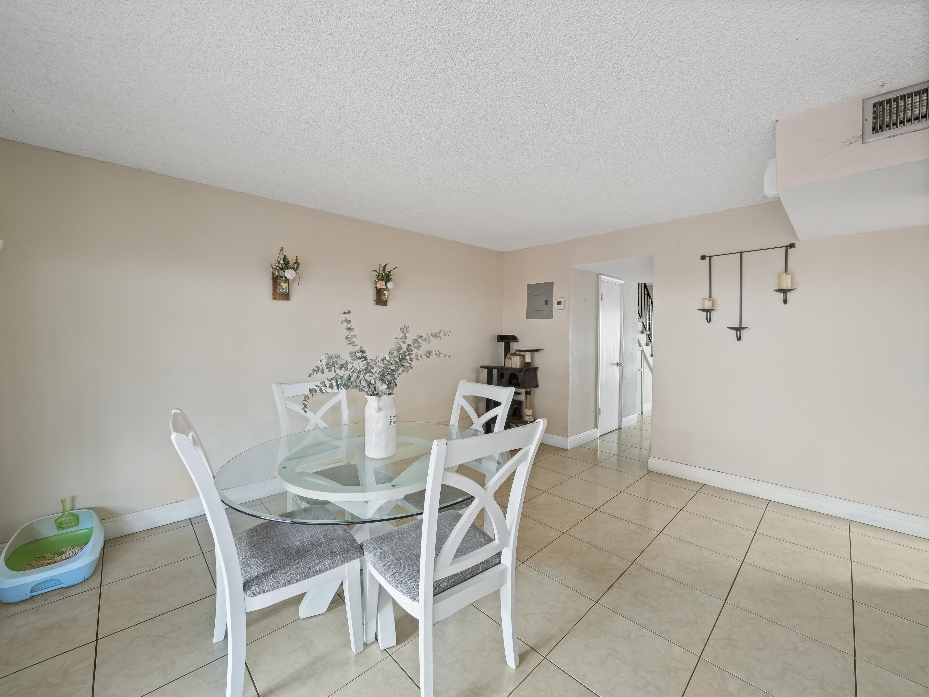 3672 Southwest 59th Terrace, Unit 73 Davie, FL 33314 - Photo 9 of 39 a dining room with furniture and window