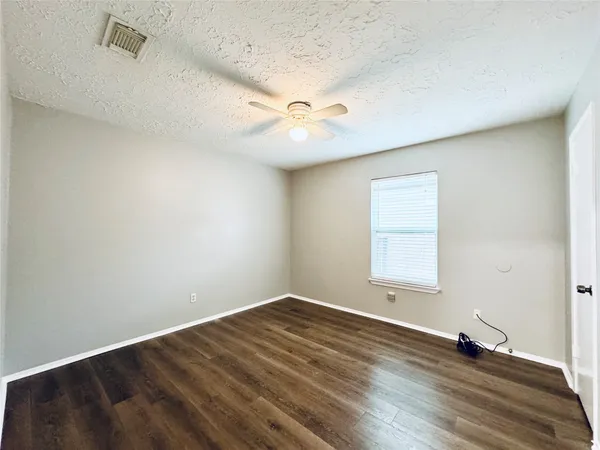 a view of small space with racks on the wall