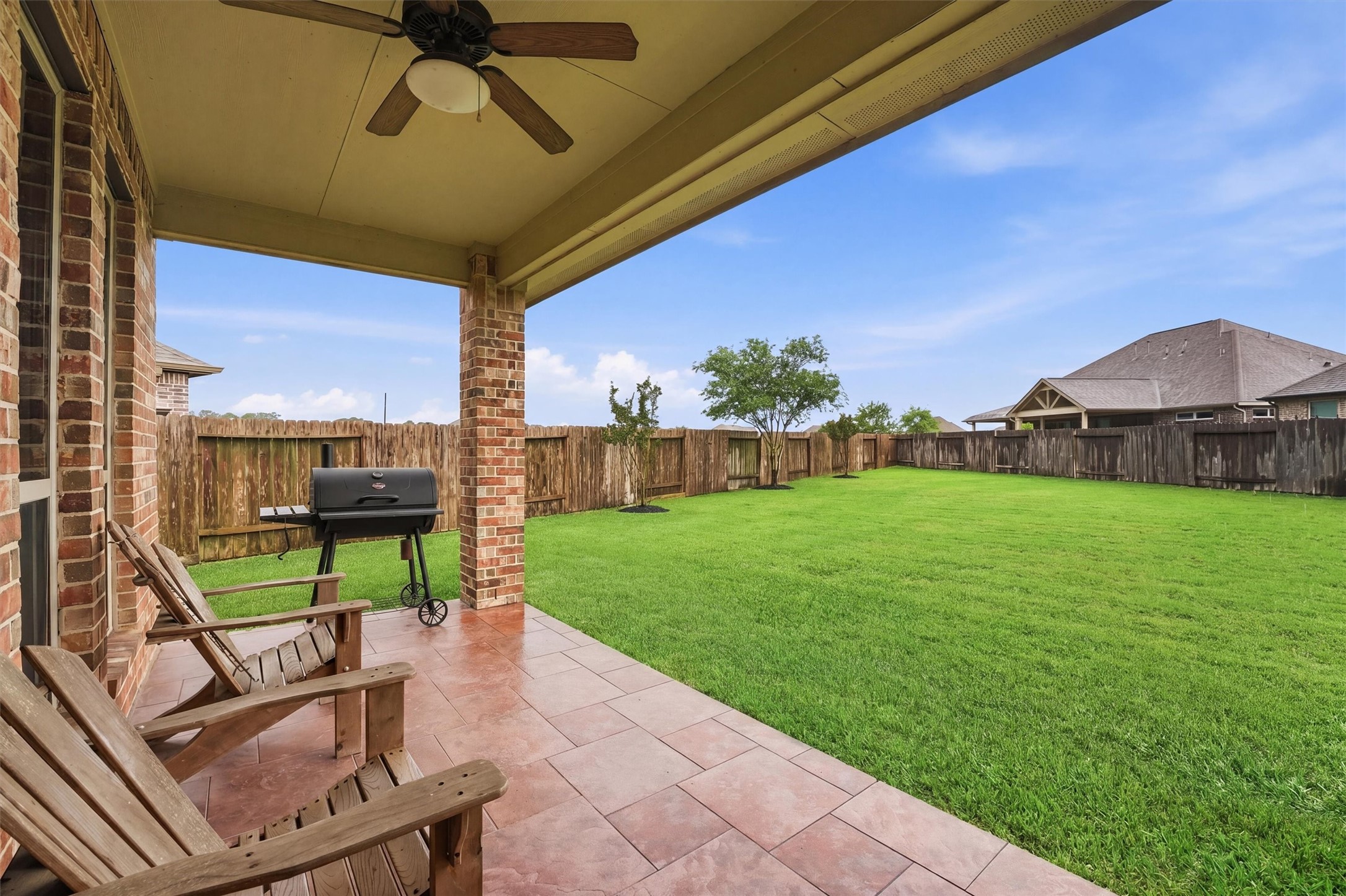 12506 Northpointe Ridge Lane Tomball, TX 77377 - Photo 26 of 31 a view of a porch with furniture and a yard