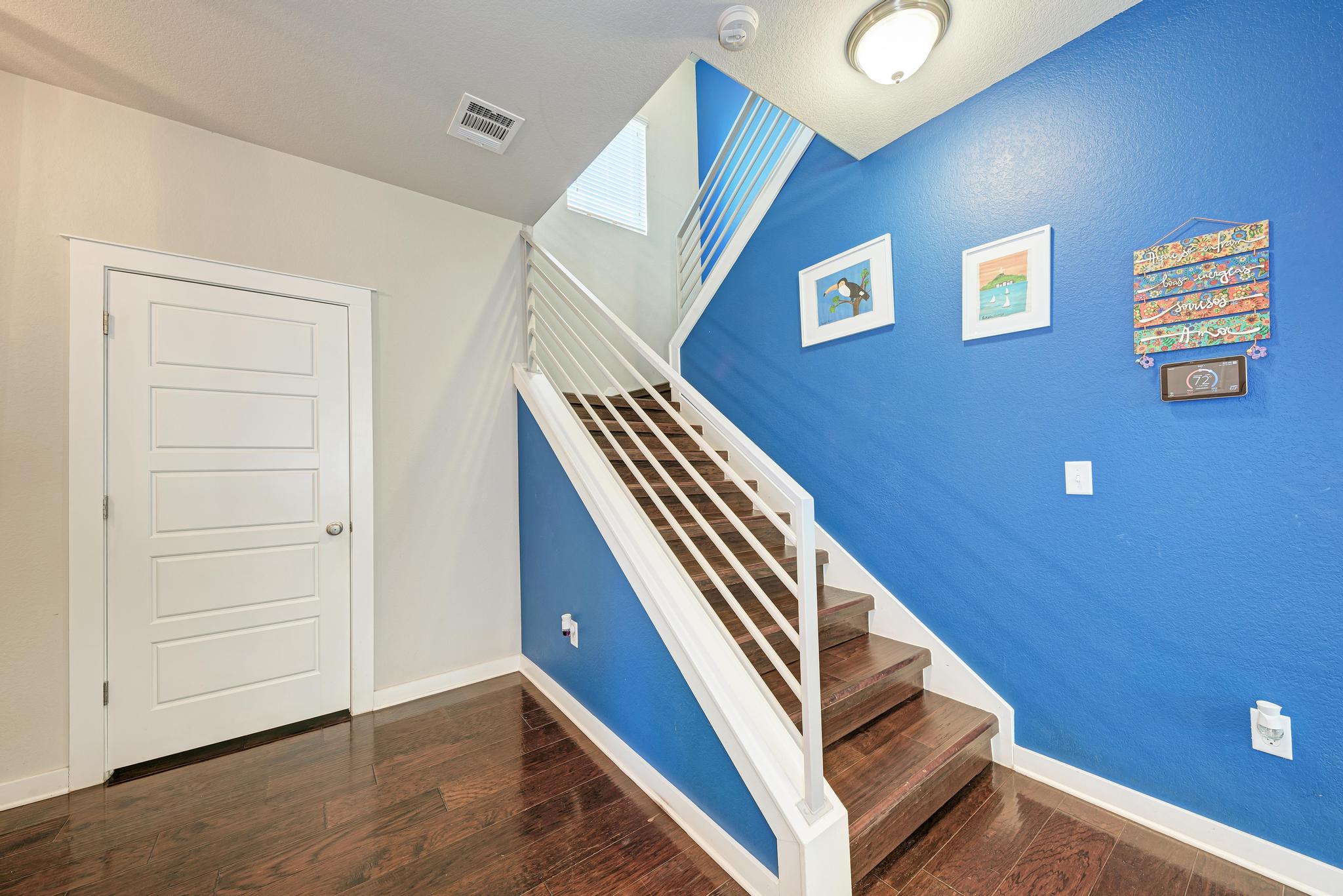 5305 Ingersoll Lane Austin, TX 78744 - Photo 14 of 27 a view of an entryway with staircase