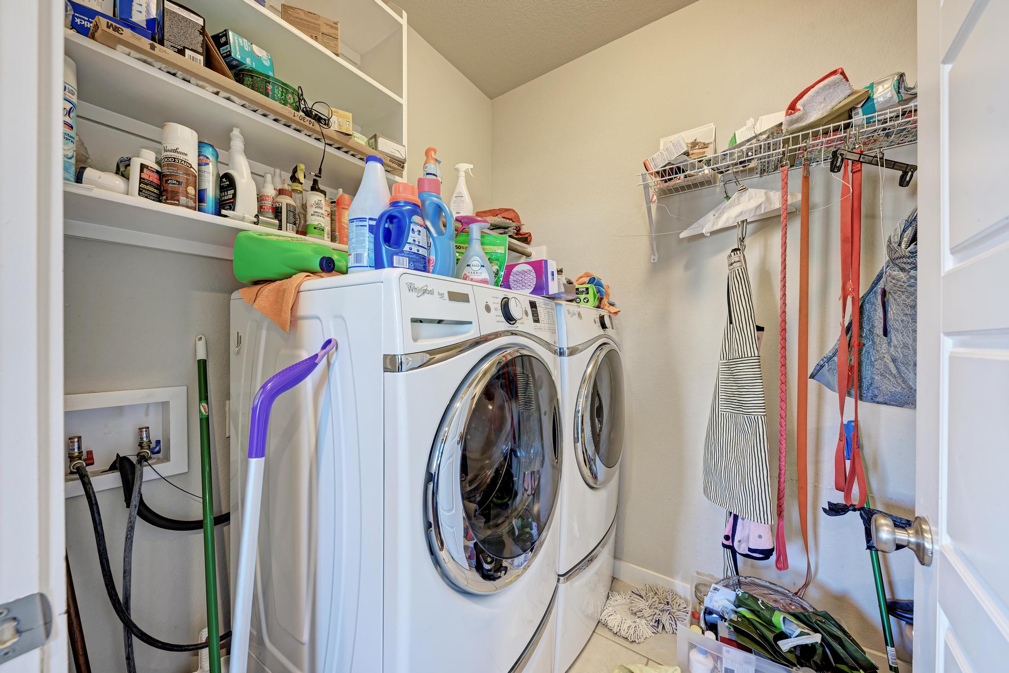 5305 Ingersoll Lane Austin, TX 78744 - Photo 22 of 27 a utility room with dryer and washer