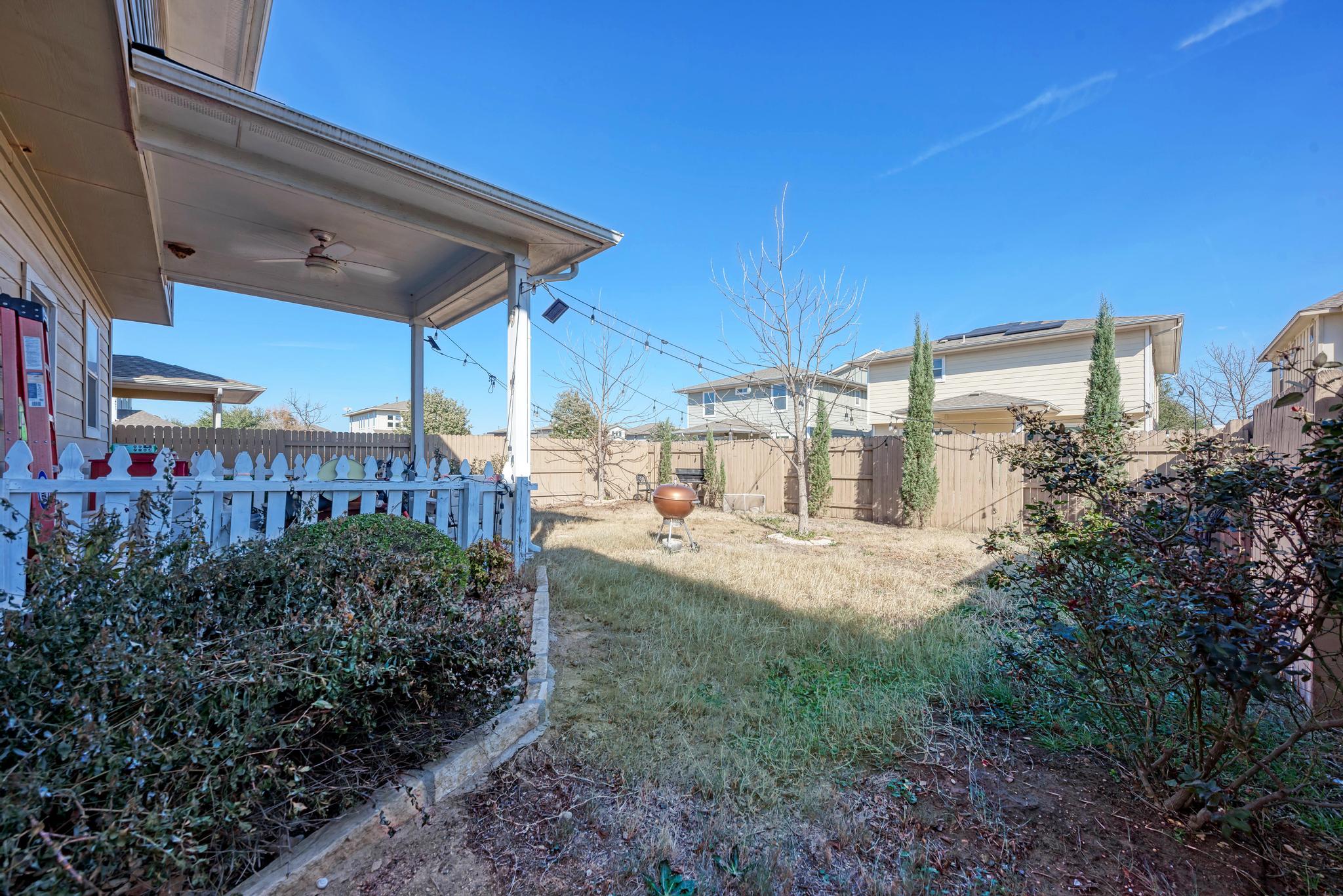 5305 Ingersoll Lane Austin, TX 78744 - Photo 24 of 27 a view of a backyard with plants