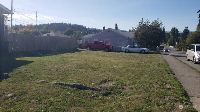 a view of a street in front of a building