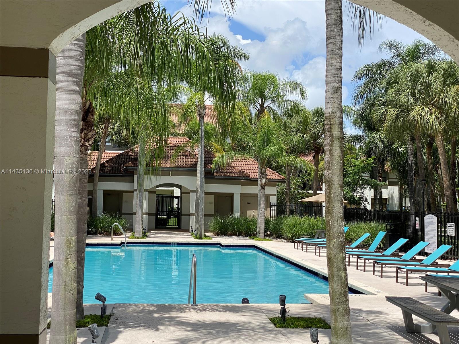 610 South Park Road, Unit 151 Hollywood, FL 33021 - Photo 33 of 34 a view of a swimming pool with a patio