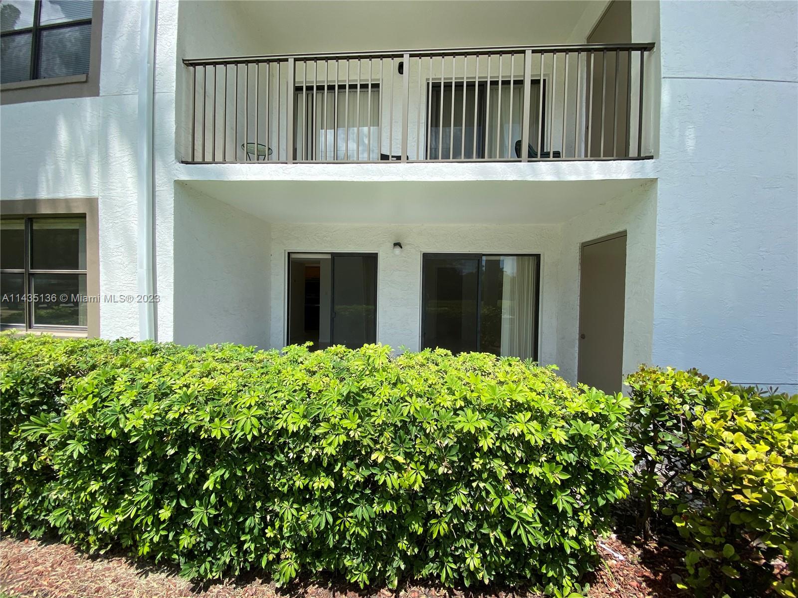 610 South Park Road, Unit 151 Hollywood, FL 33021 - Photo 4 of 34 a house view with a garden space