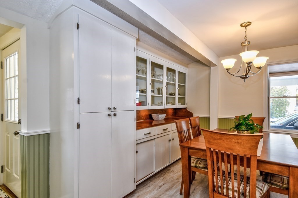2 Gilmore Road Southborough, MA 01772 - Photo 15 of 33 a dining room with furniture a chandelier and window