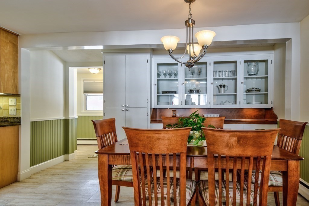 2 Gilmore Road Southborough, MA 01772 - Photo 17 of 33 a view of a dining room with furniture and chandelier