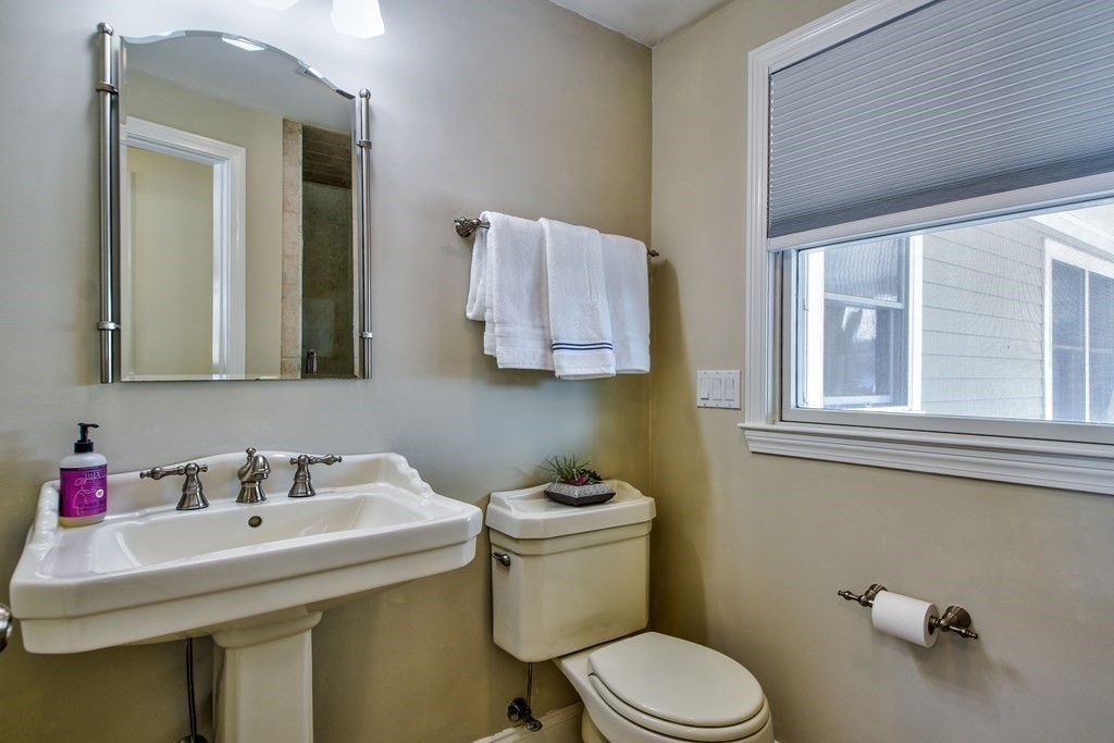 2 Gilmore Road Southborough, MA 01772 - Photo 20 of 33 a bathroom with a sink toilet and a mirror