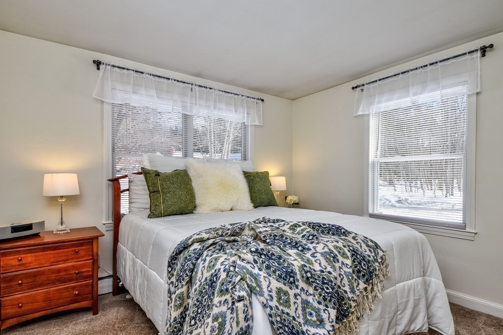 2 Gilmore Road Southborough, MA 01772 - Photo 24 of 33 a bed sitting in a bedroom next to a window