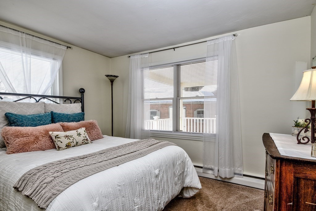 2 Gilmore Road Southborough, MA 01772 - Photo 26 of 33 a bedroom with a bed and wooden floor