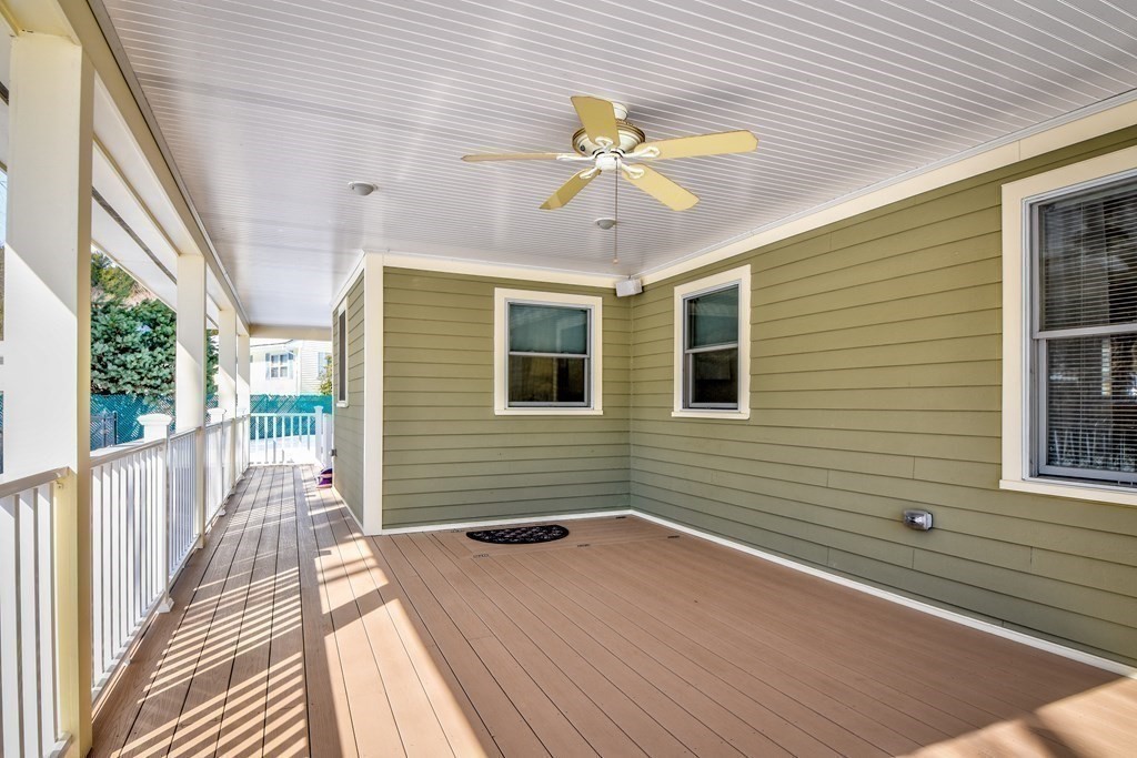 2 Gilmore Road Southborough, MA 01772 - Photo 30 of 33 a view of a livingroom with wooden floor and a ceiling fan