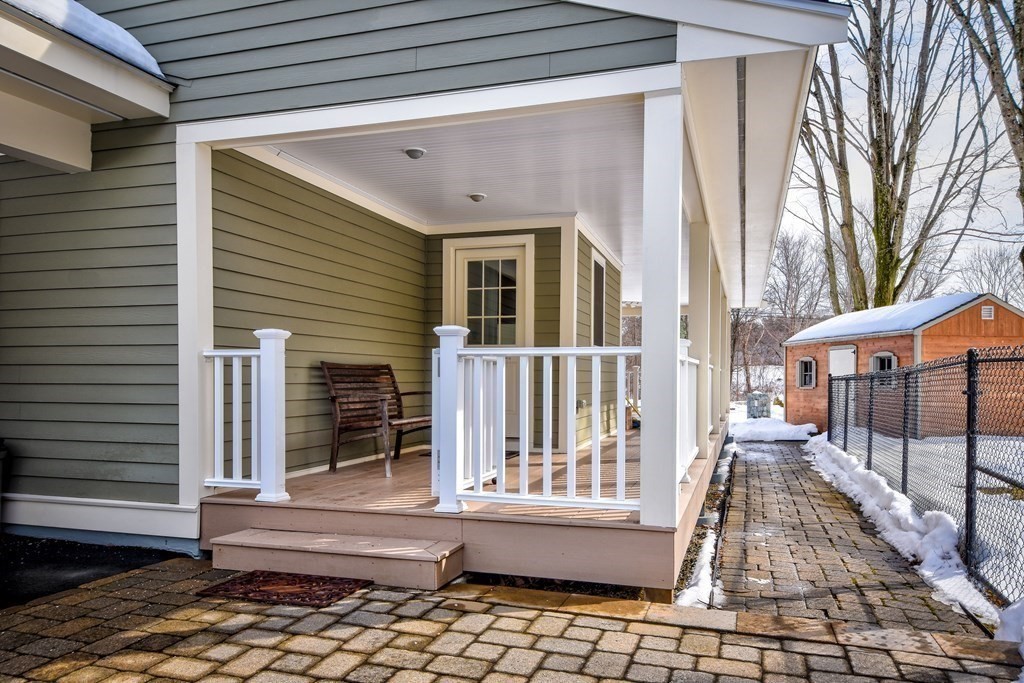 2 Gilmore Road Southborough, MA 01772 - Photo 4 of 33 a porch with seating space