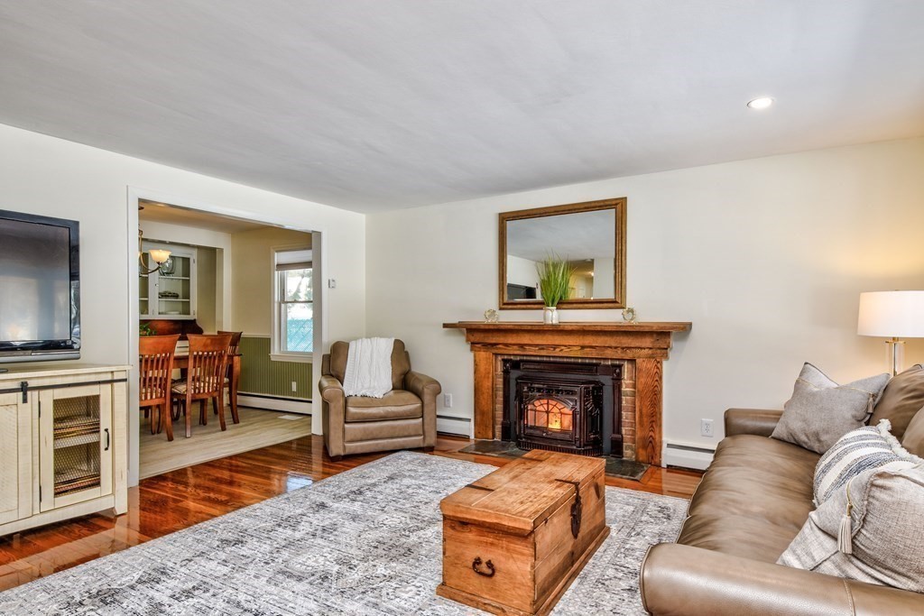2 Gilmore Road Southborough, MA 01772 - Photo 5 of 33 a living room with furniture and a fireplace