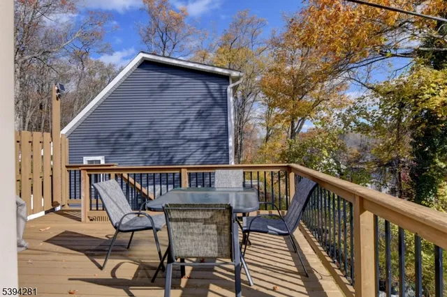a view of backyard with outdoor seating