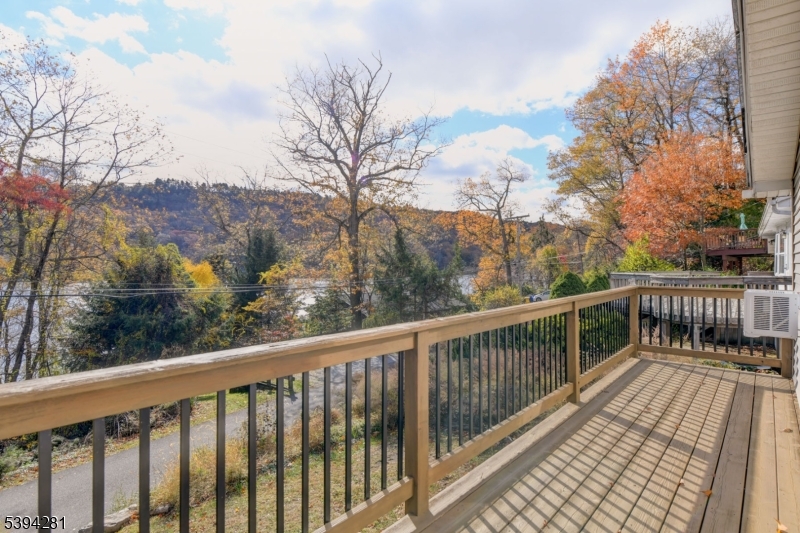 9 Woods Road Branchville, NJ 07826 - Photo 16 of 21 a view of balcony with wooden floor and fence