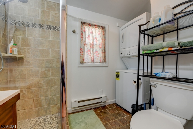 9 Woods Road Branchville, NJ 07826 - Photo 10 of 21 a bathroom with a sink toilet and shower
