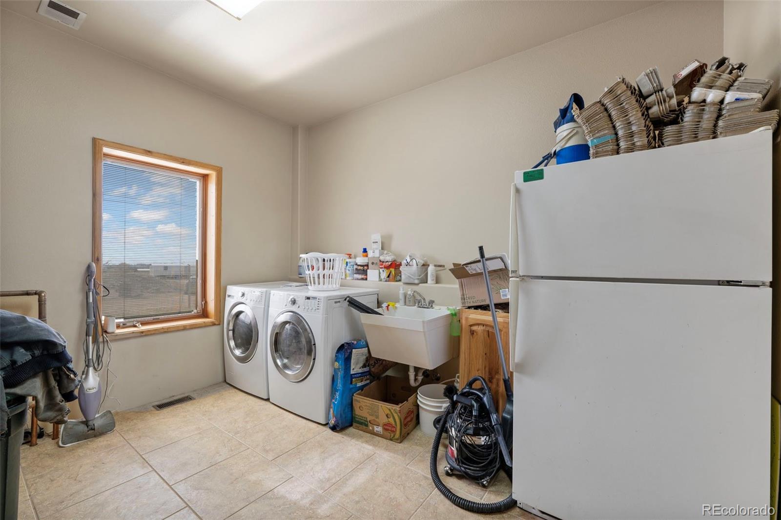 988 P Street Penrose, CO 81240 - Photo 19 of 48 a very nice looking room with a large window