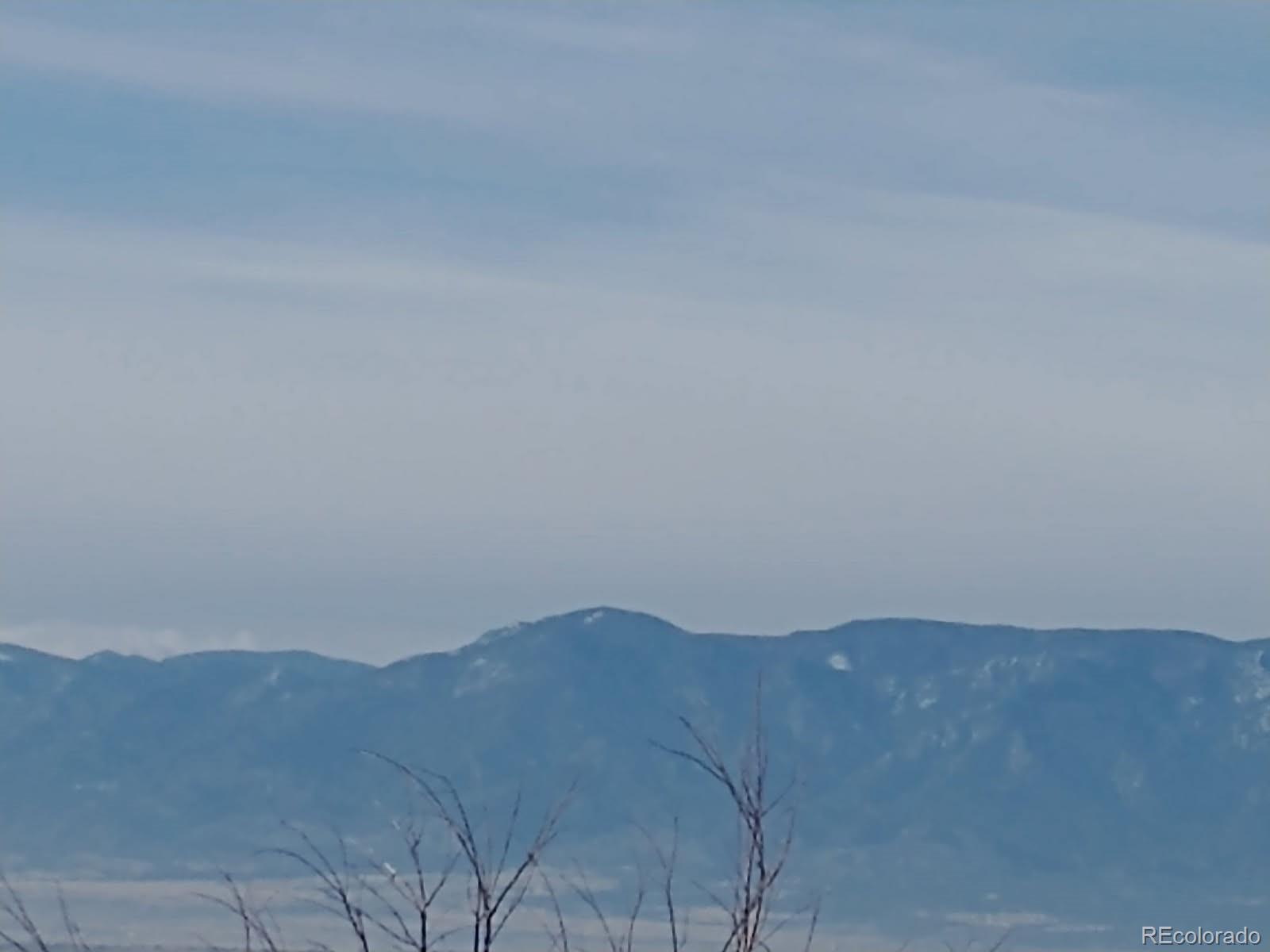 988 P Street Penrose, CO 81240 - Photo 31 of 48 a view of an empty room and mountains