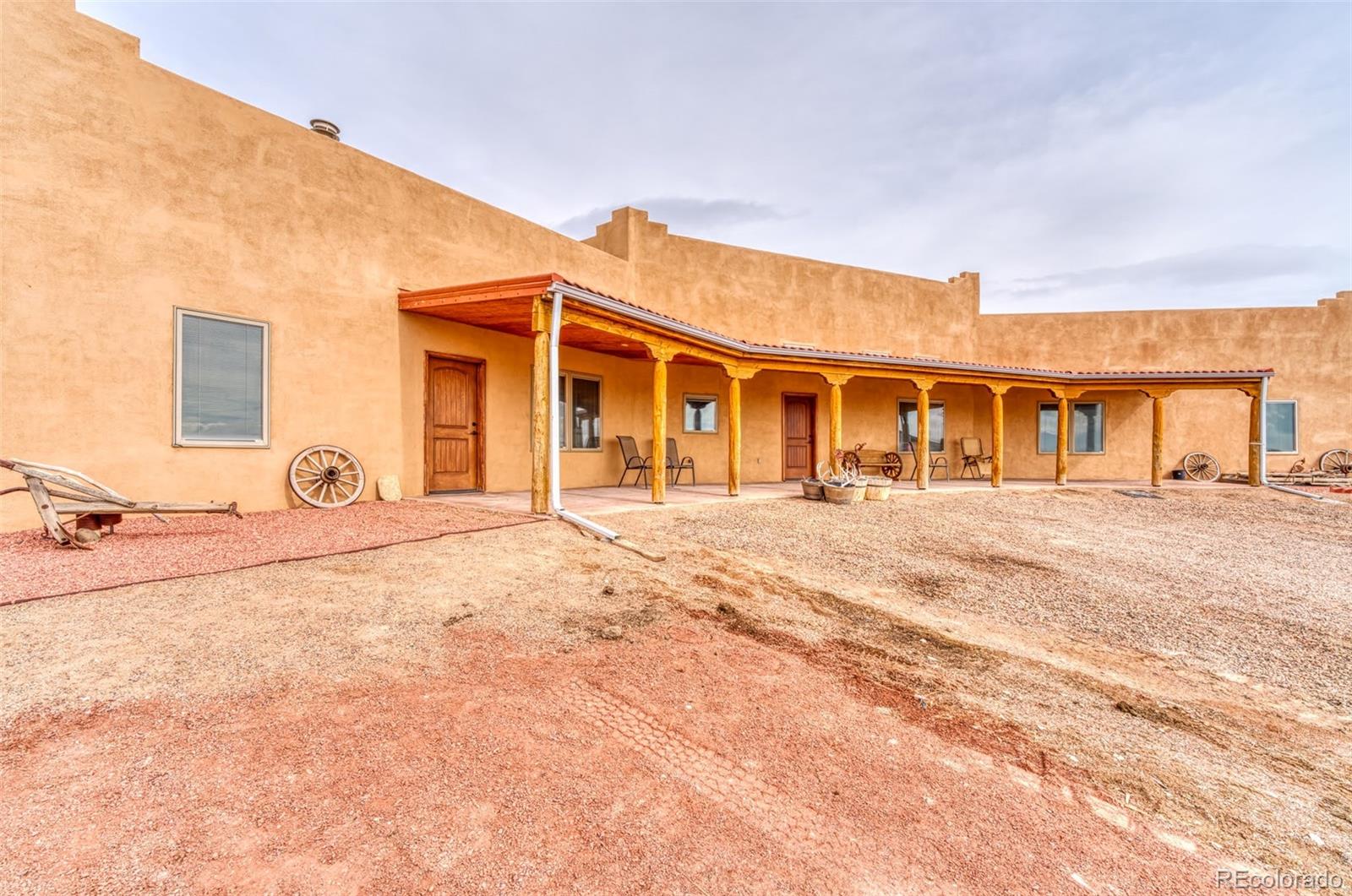 988 P Street Penrose, CO 81240 - Photo 45 of 48 a view of a house with snow on the road