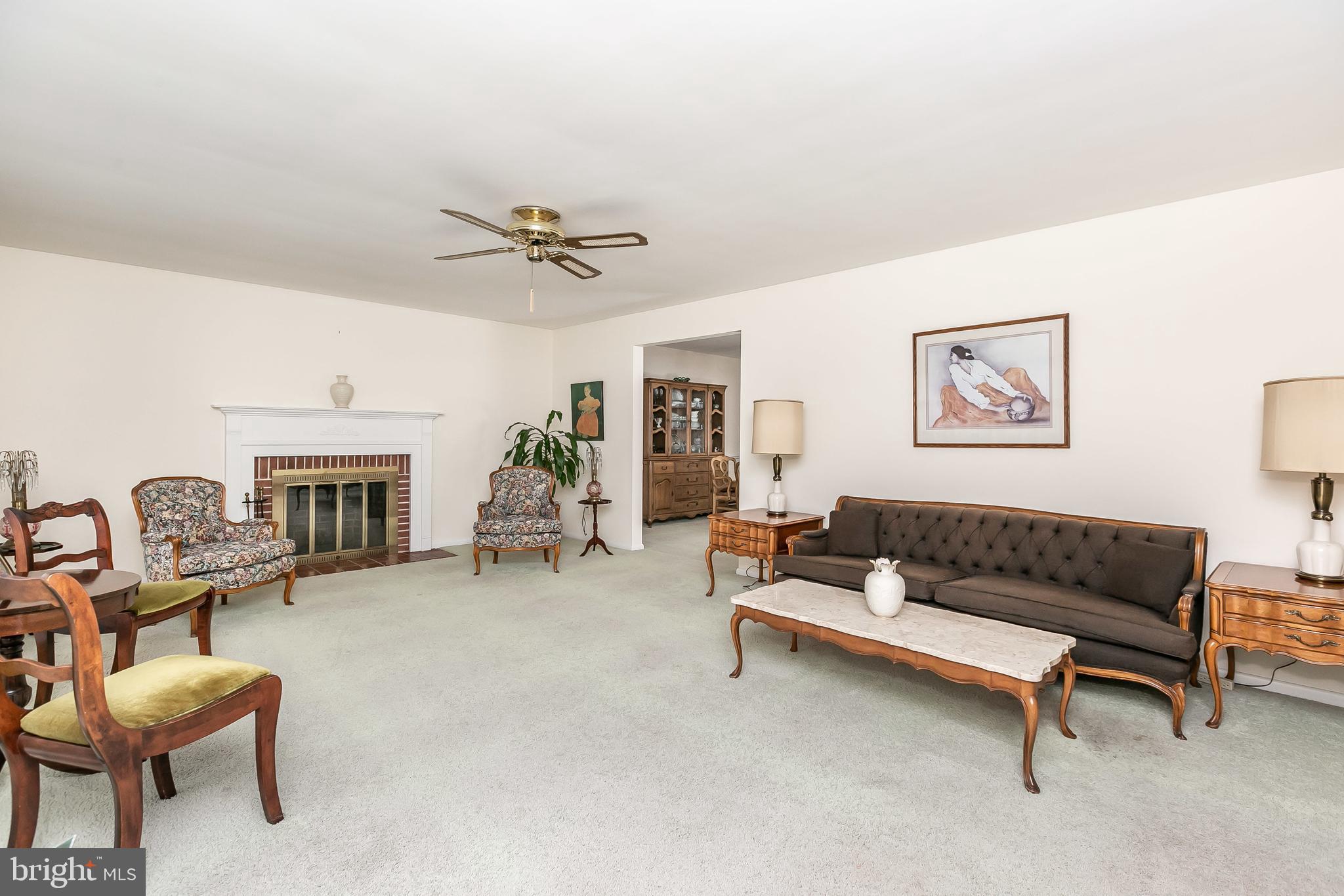 Large living room w/wood-burning fireplace