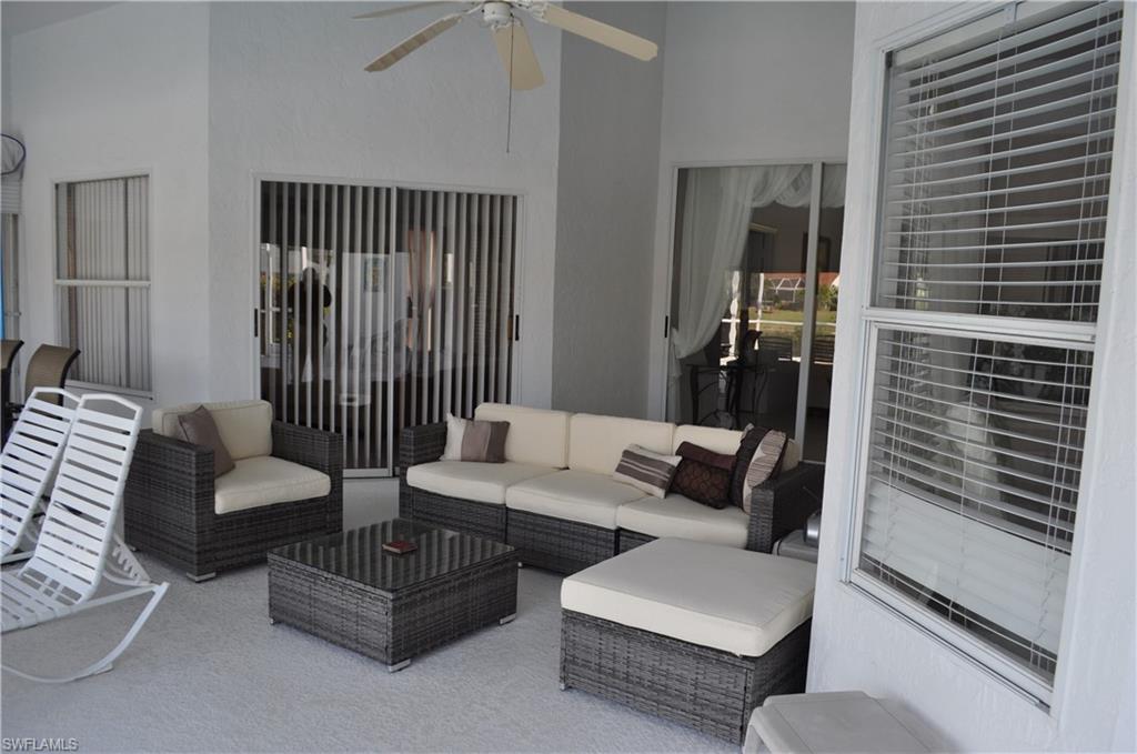 431 Dundee Court Naples, FL 34104 - Photo 20 of 20 a living room with furniture and a window