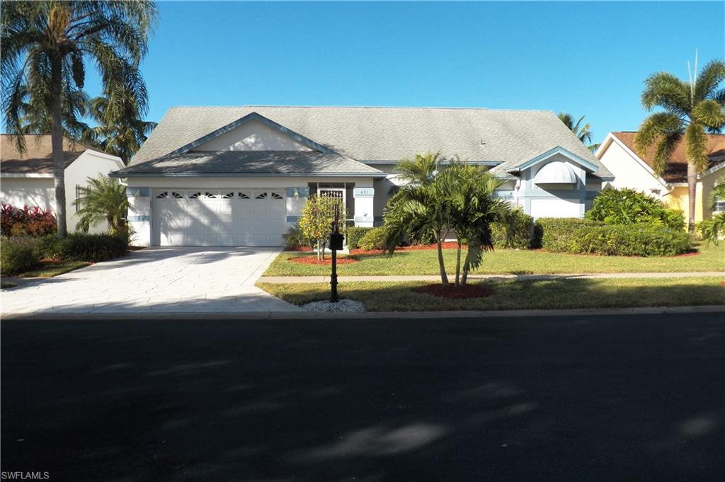431 Dundee Court Naples, FL 34104 - Photo 3 of 20 a view of a house with a yard