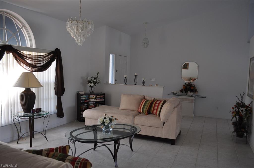 431 Dundee Court Naples, FL 34104 - Photo 5 of 20 a living room with furniture