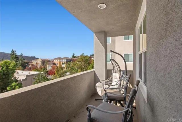 a view of a window and chair in a room
