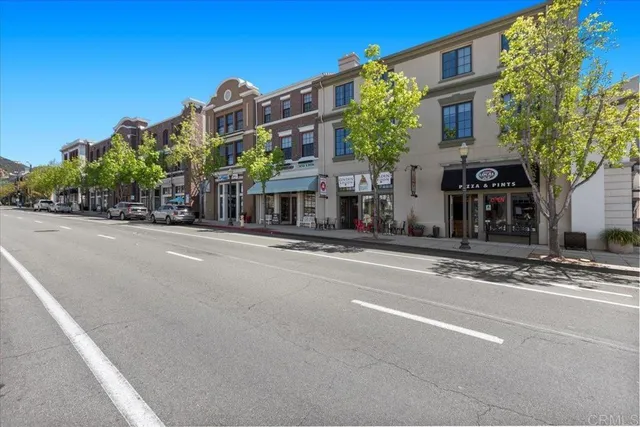 a view of a building with a street