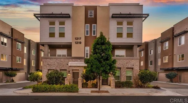a view of a street with cars