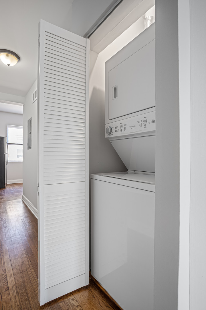 7326 North Damen Avenue, Unit 3 Chicago, IL 60645 - Photo 9 of 14 a view of a storage & utility room with washer and dryer