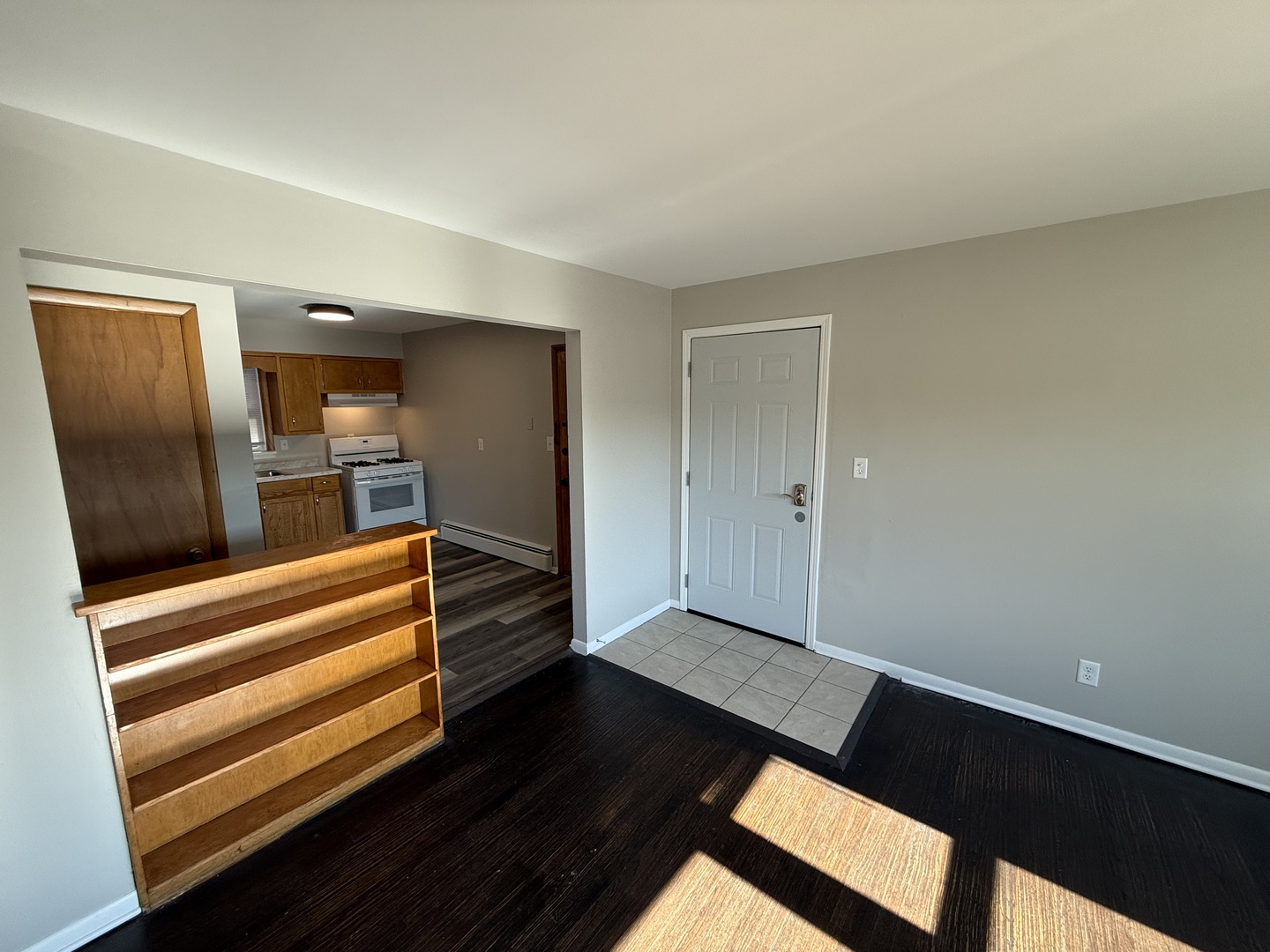 17909 Torrence Avenue, Unit 3 Lansing, IL 60438 - Photo 6 of 9 wooden floor in an empty room