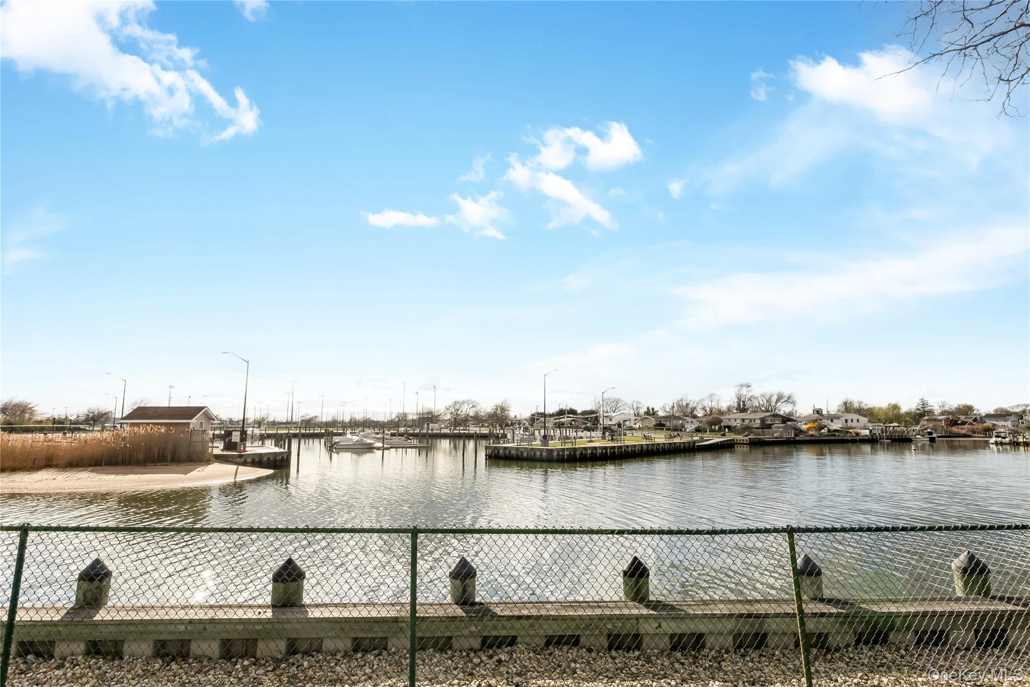 140 Mariners Way Copiague, NY 11726 - Photo 26 of 26 a close up of a lake view