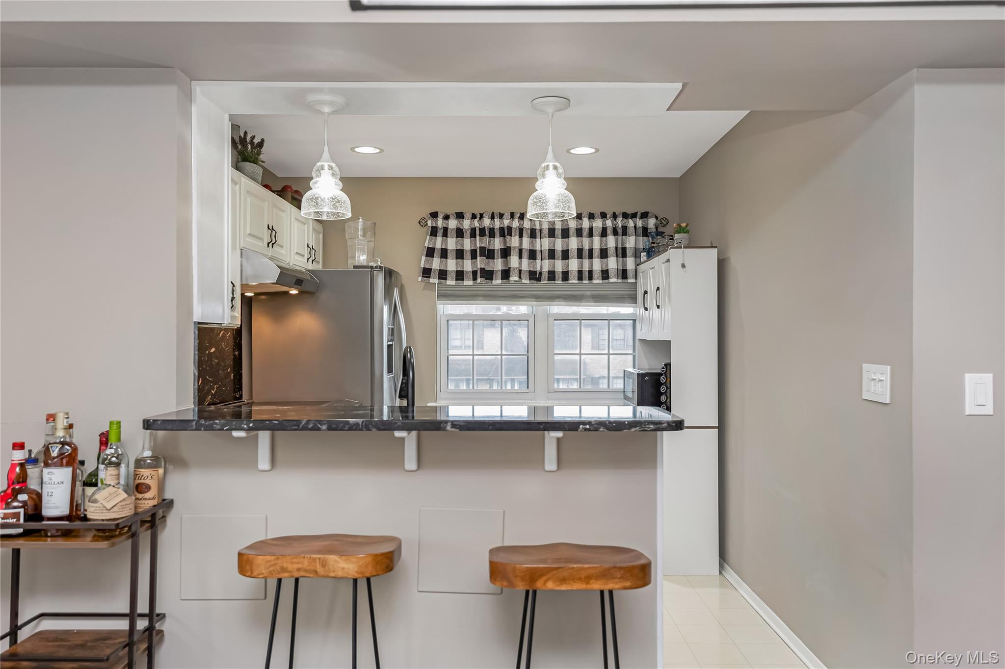140 Mariners Way Copiague, NY 11726 - Photo 5 of 26 a view of kitchen with chair and cabinets