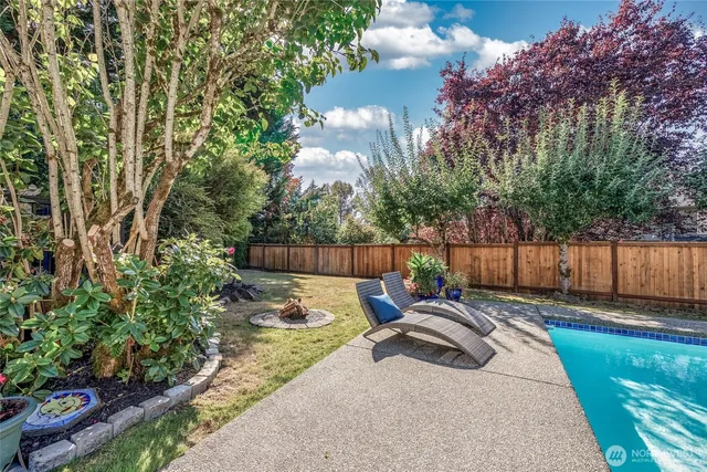 a view of a backyard with a patio