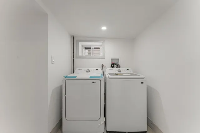 a bathroom with a sink a toilet and vanity