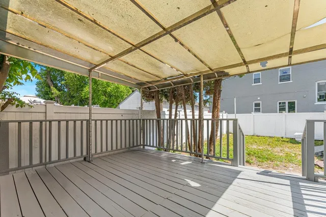 a front view of a house with a porch