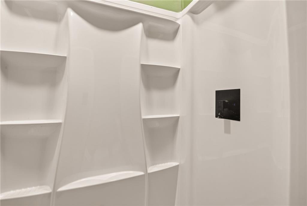 403 9th Street Windber, PA 15963 - Photo 12 of 34 a bathroom with a shower and a mirror