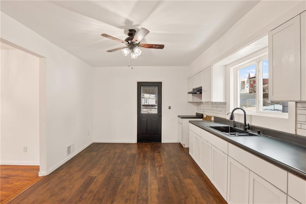403 9th Street Windber, PA 15963 - Photo 15 of 34 a kitchen with a sink and cabinets